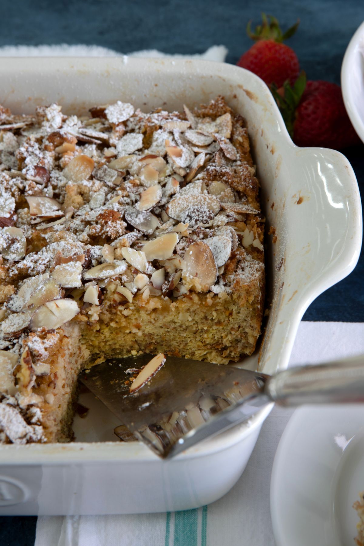 a pie knife resting on a baking dish