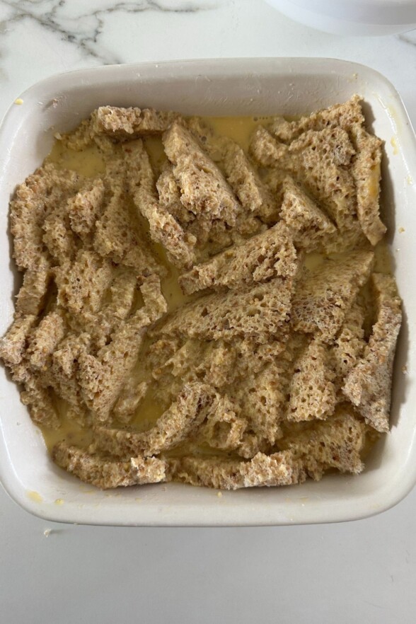 slices of bread in a baking dish