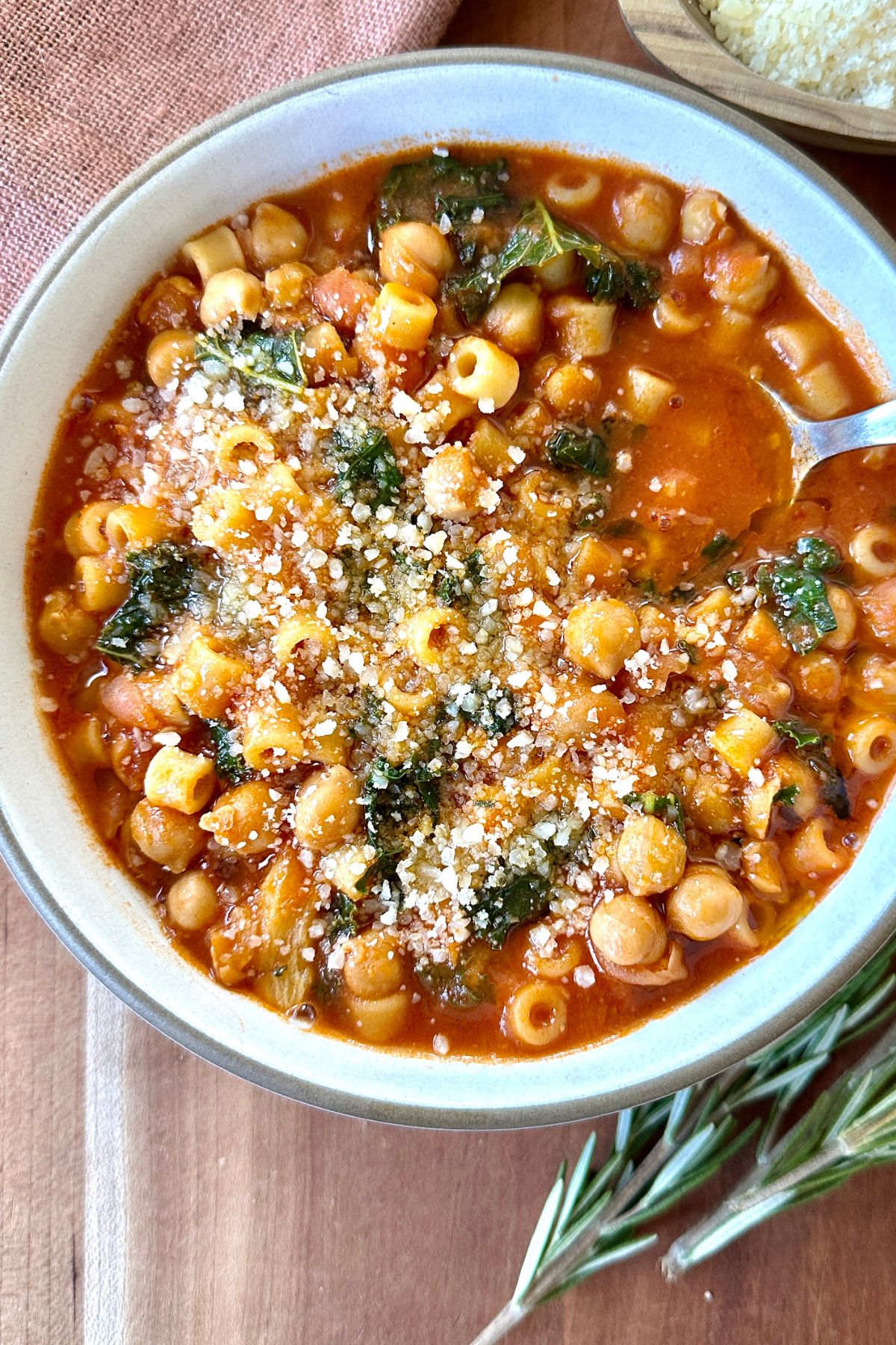 Bowl of Pasta e Ceci, Italian chickpea pasta, served with grated Parmesan.