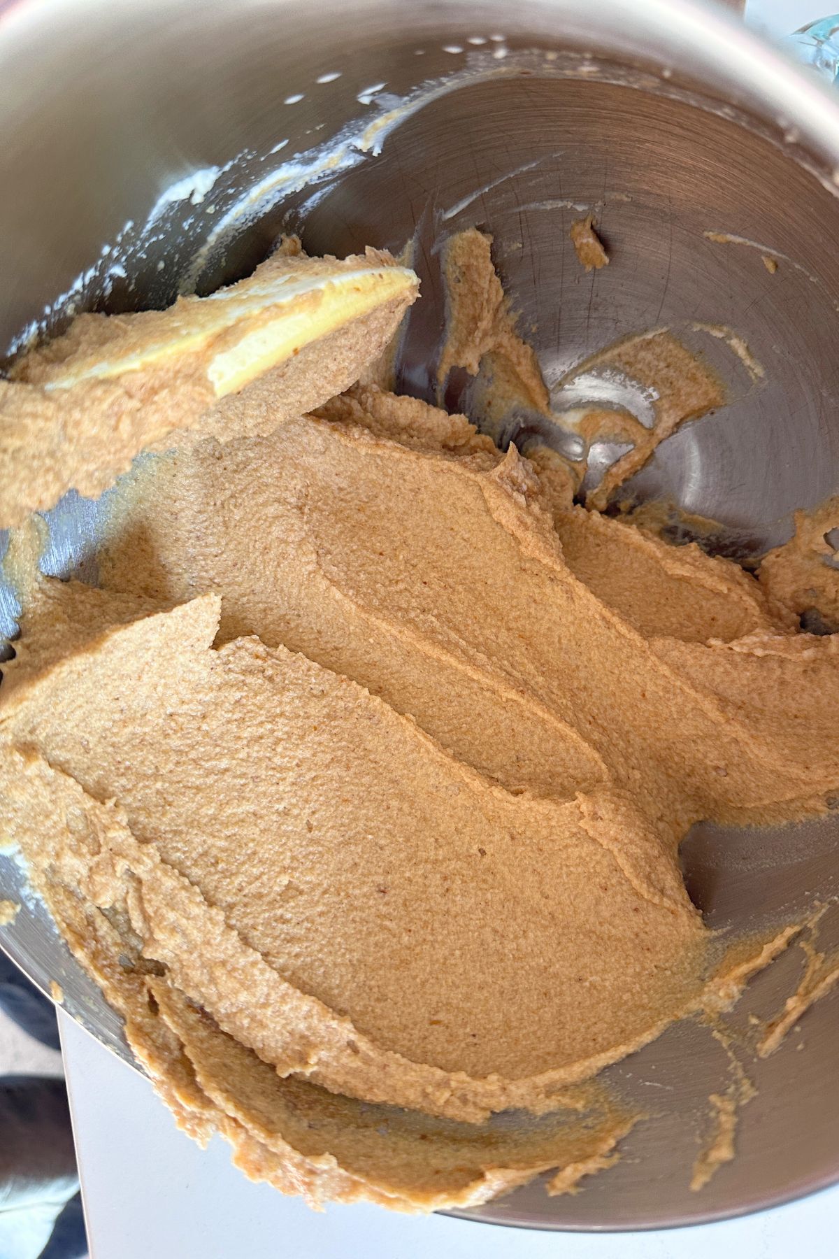 A large bowl with Mascarpone, heavy cream, pumpkin butter and salt.