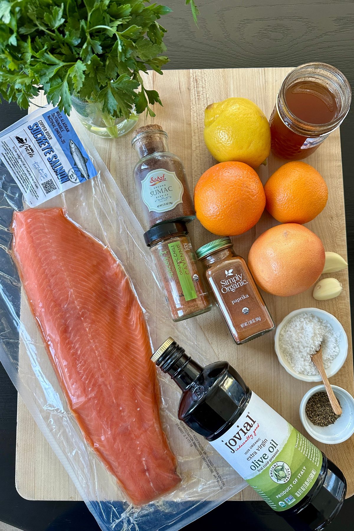 recipe ingredients on a cutting board for sumac salmon